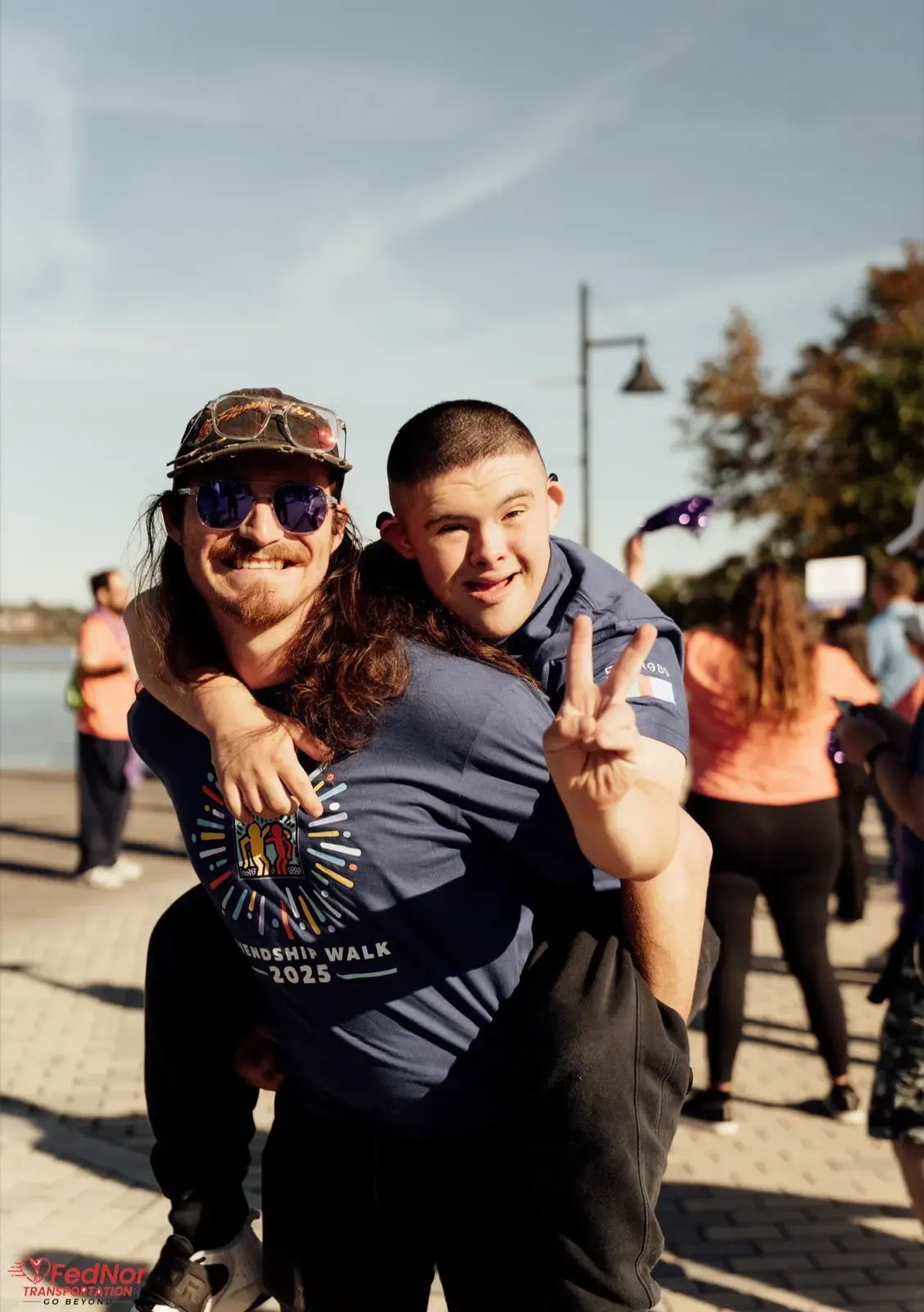 Friends celebrating at the Best Buddies Friendship Walk 2025