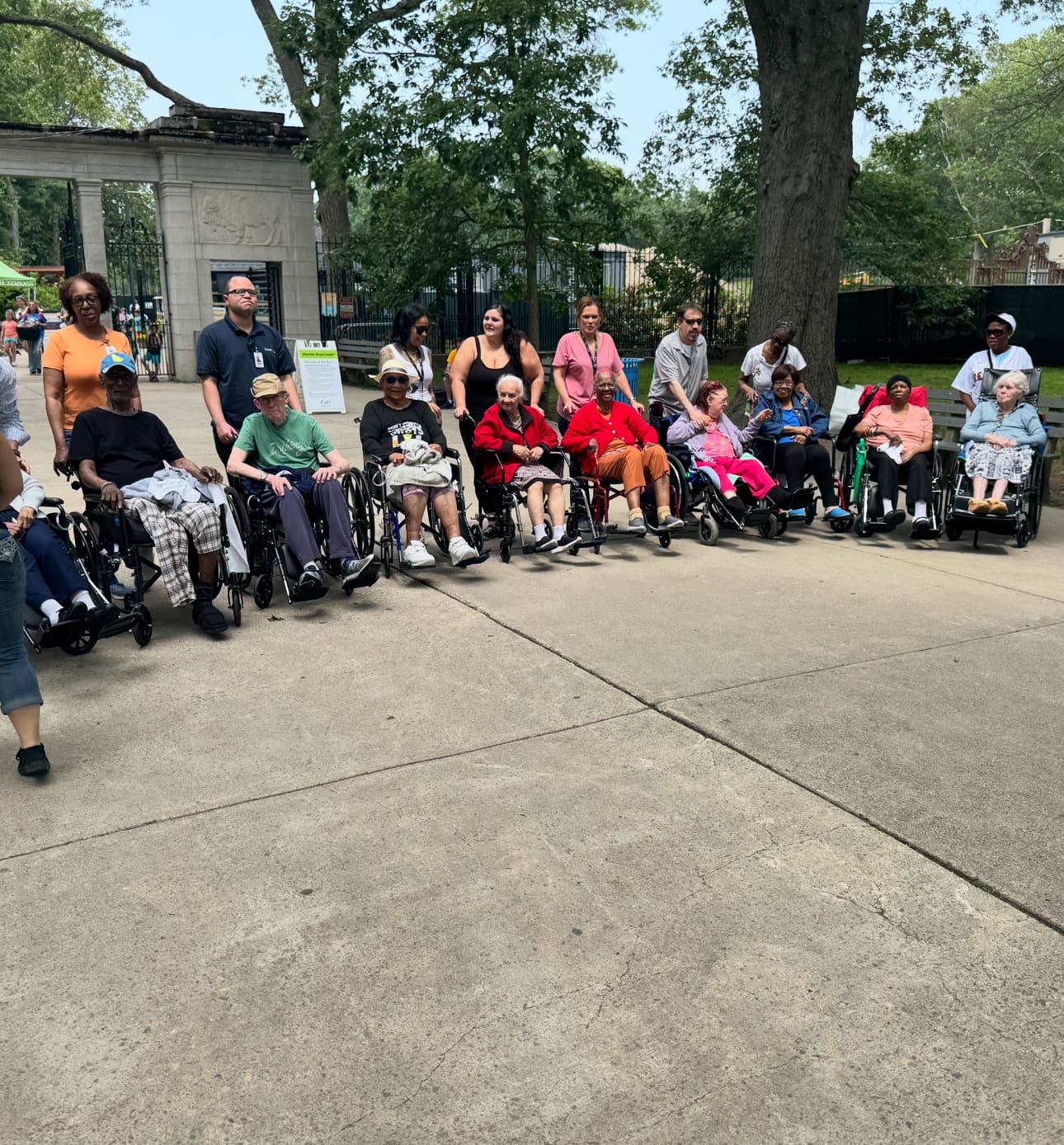 Residents and caregivers gathered at the Franklin Park Zoo entrance