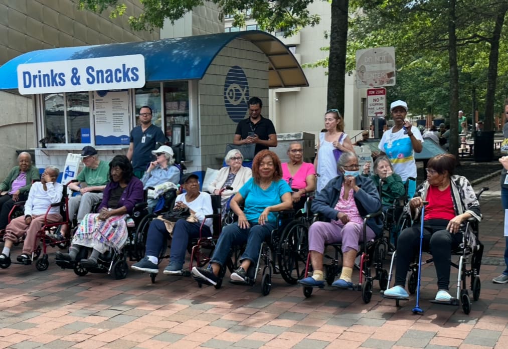Group of residents enjoying a day out at the Drinks & Snacks plaza