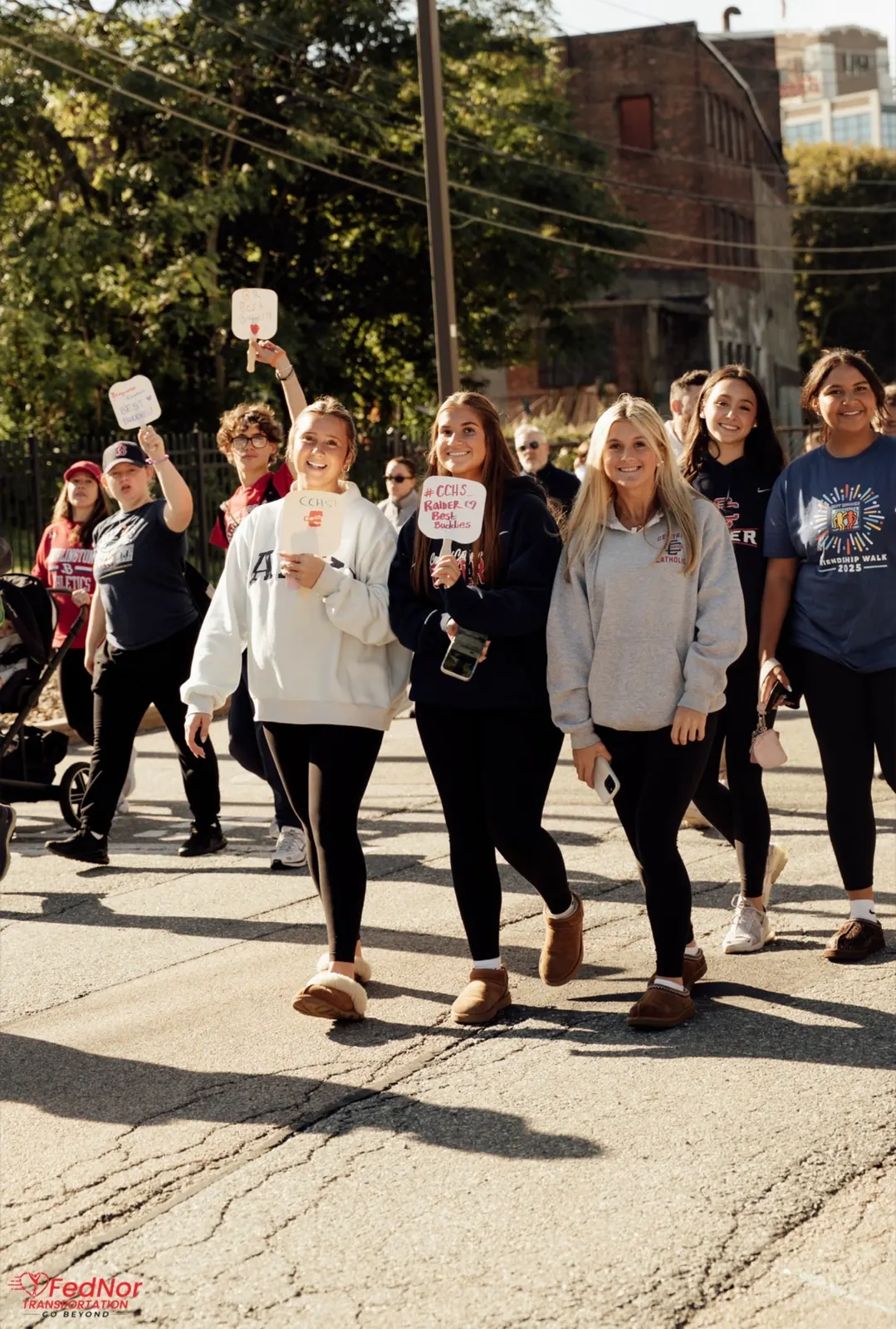 Students walking together for Best Buddies